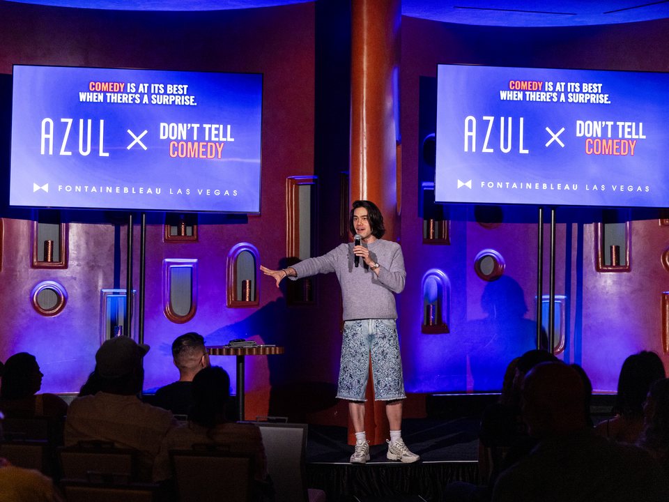 A comedian performs on the Azul x Don't Tell Comedy stage at Fontainebleau Las Vegas